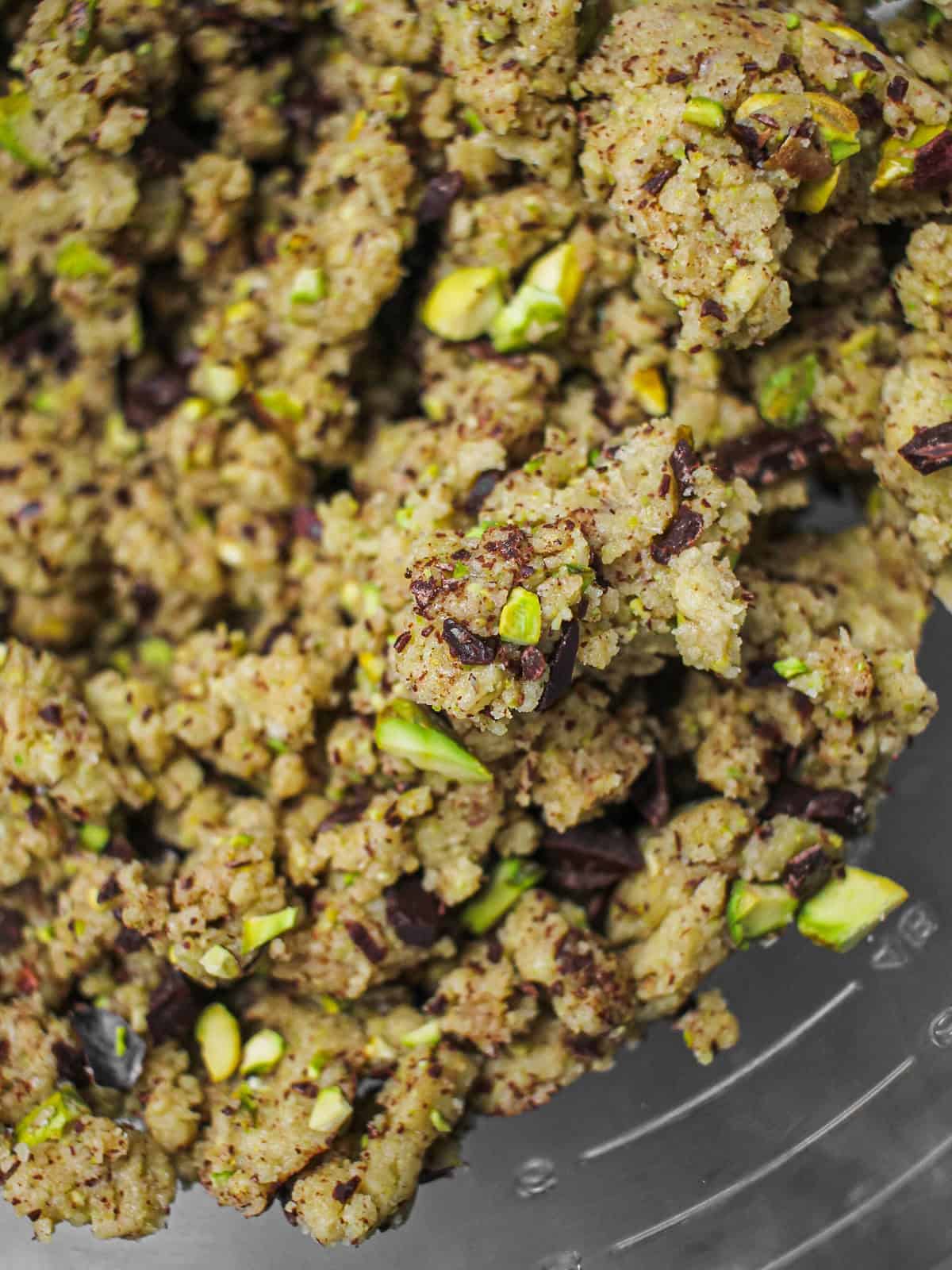 Cookie dough with dark chocolate chunks and chopped pistachios folded in.