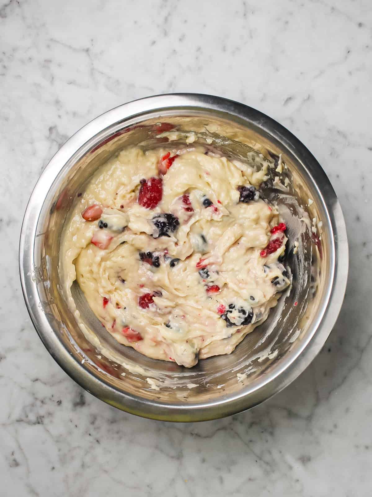 Fresh mixed berries folded into cake batter.