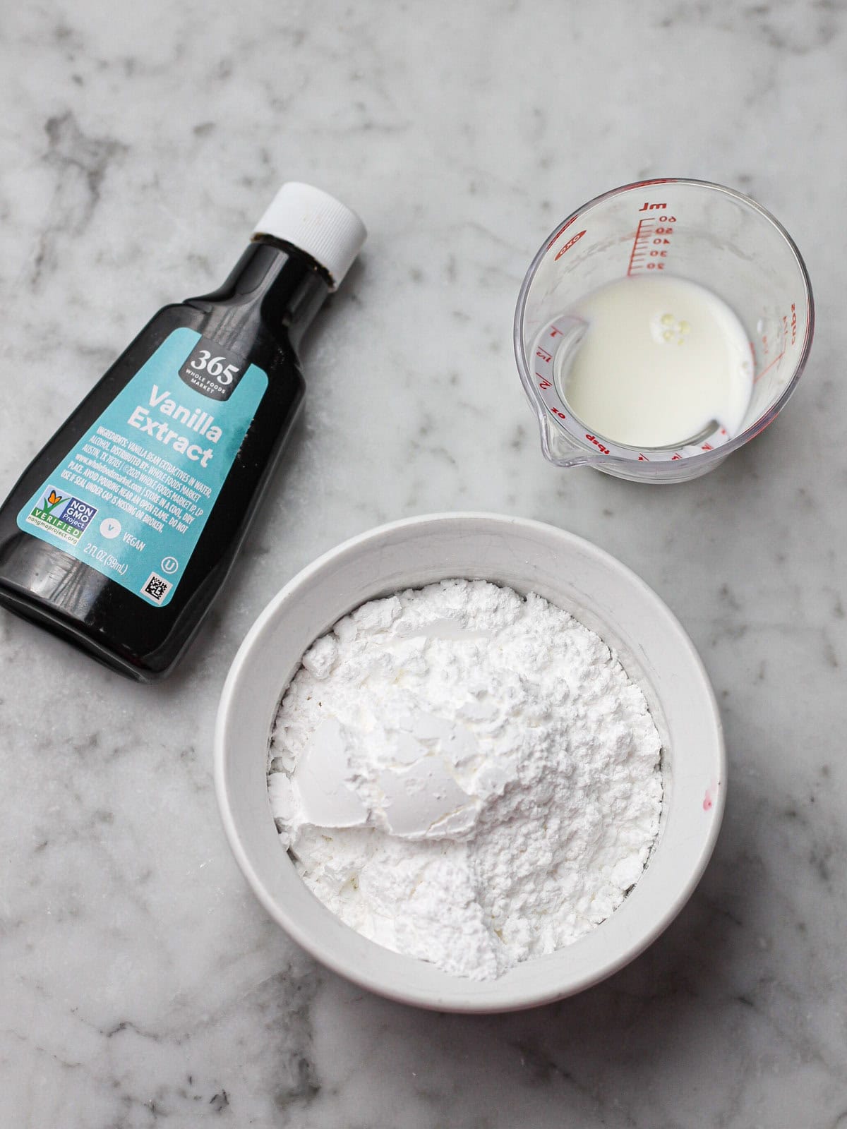Overlay shot of ingredients for vanilla glaze.